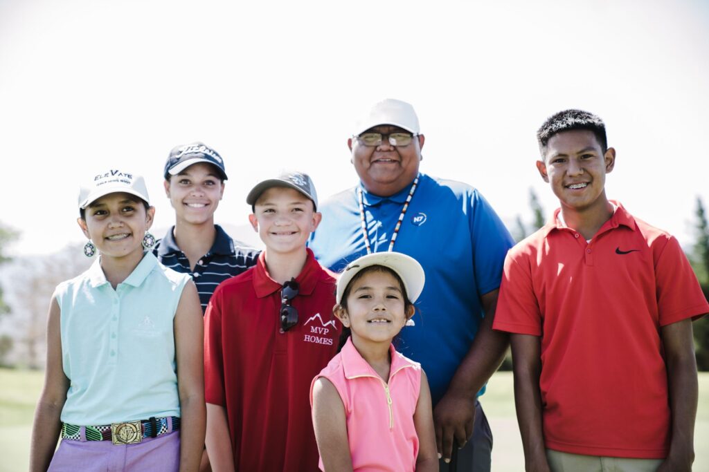 A group of young golfers celebrating their achievements at the Dungeness Youth Golf Challenge during the Dungeness golf tournaments 2026.