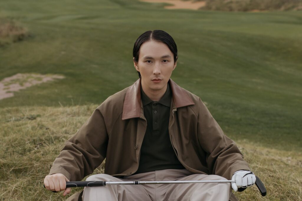 A portrait of a notable local golfer who contributed to the history of golf in Dungeness. — history of golf Dungeness