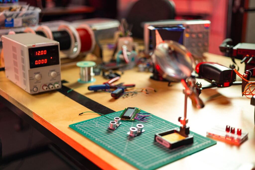 A selection of innovative golf gadgets displayed on a table — golf accessories Dungeness
