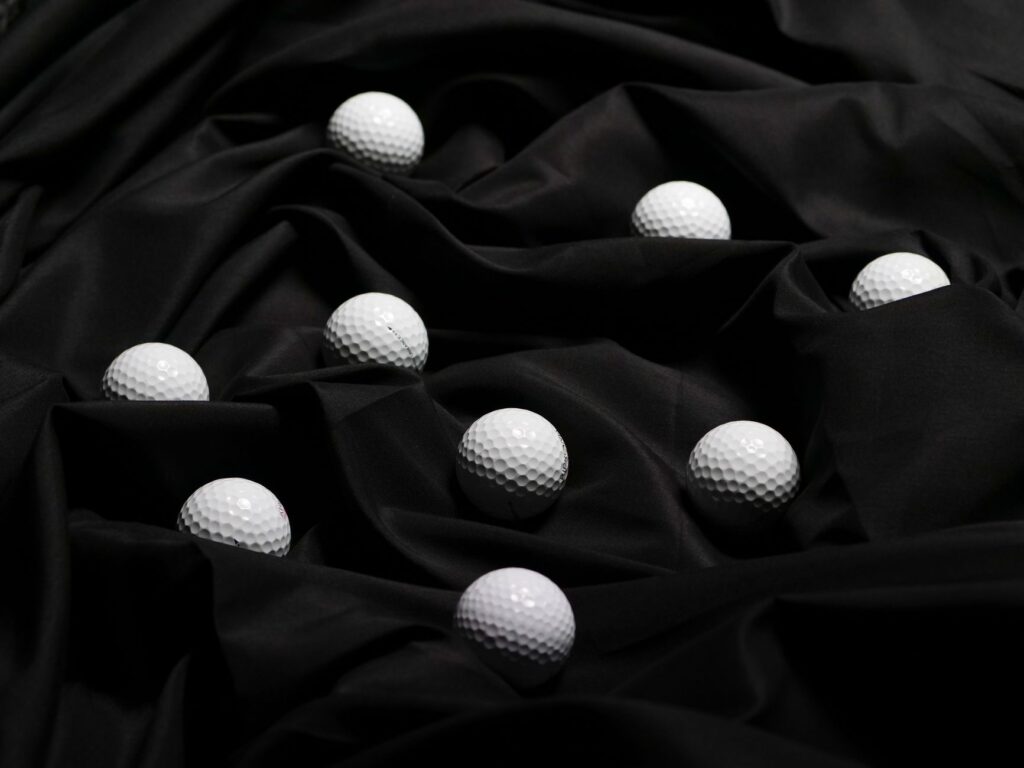 An array of golf balls designed for windy conditions — golf equipment Dungeness