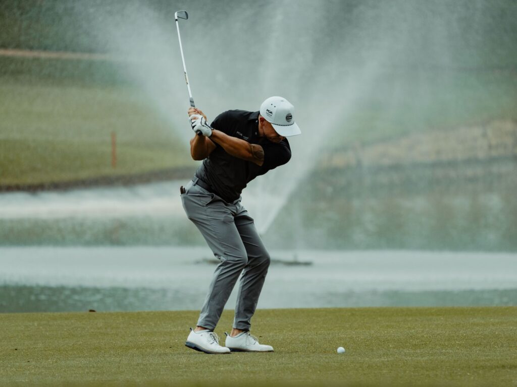 An image of a golfer focusing on coordination during a swing. — golf timing rhythm