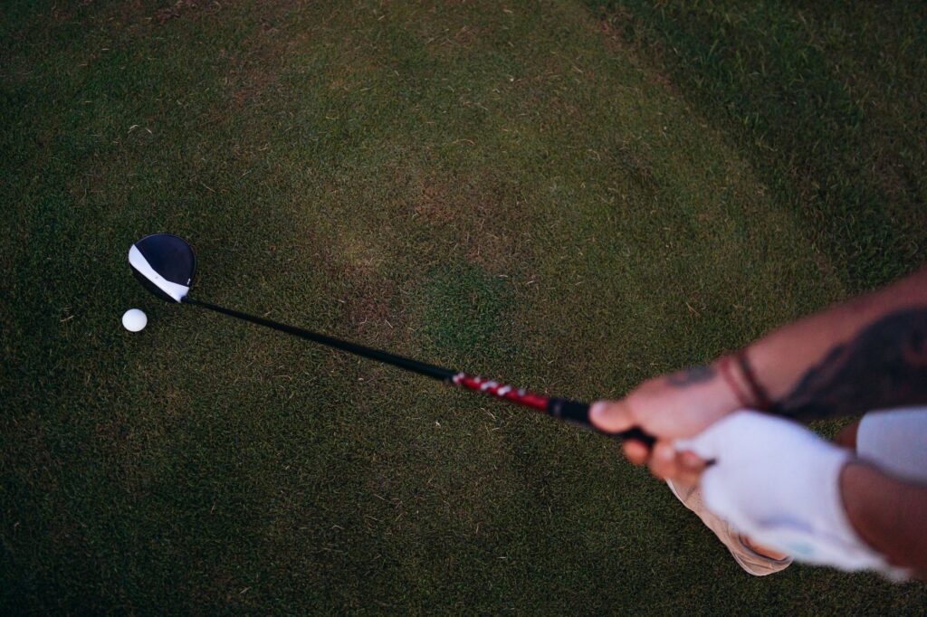 An overhead view of a golfer's stance during a swing. — Dungeness golf swing tips