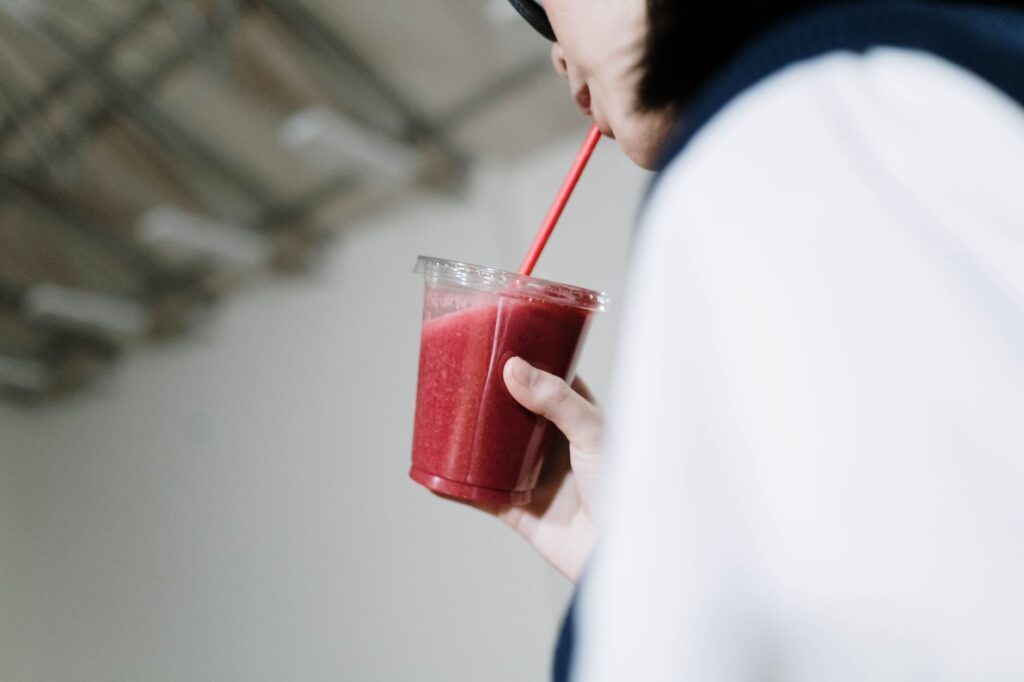 Close-up of a hydration drink and nutrition snacks suitable for recovery — golf recovery tips
