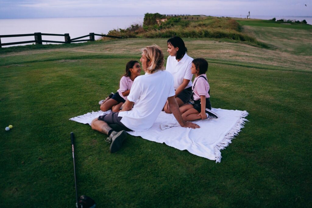 Families taking a break at a course's picnic area. — family-friendly golf Dungeness