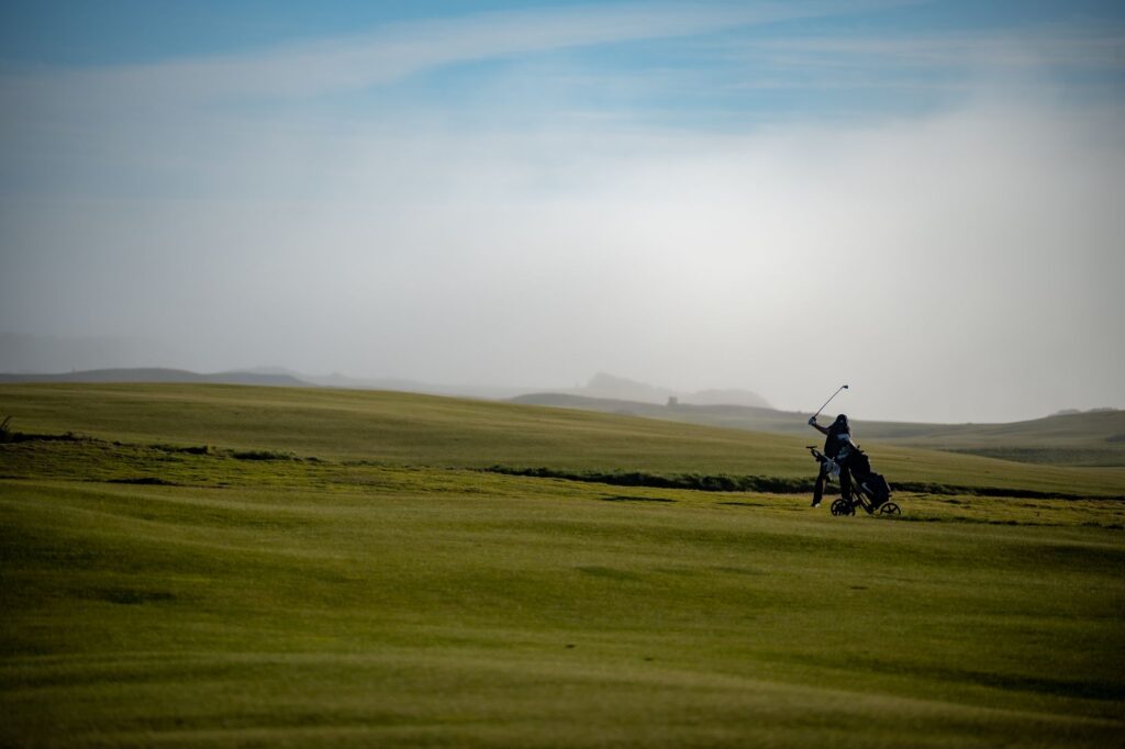 Image of a renowned golfer participating in a tournament at Dungeness Golf, reflecting the rich history of Dungeness Golf.