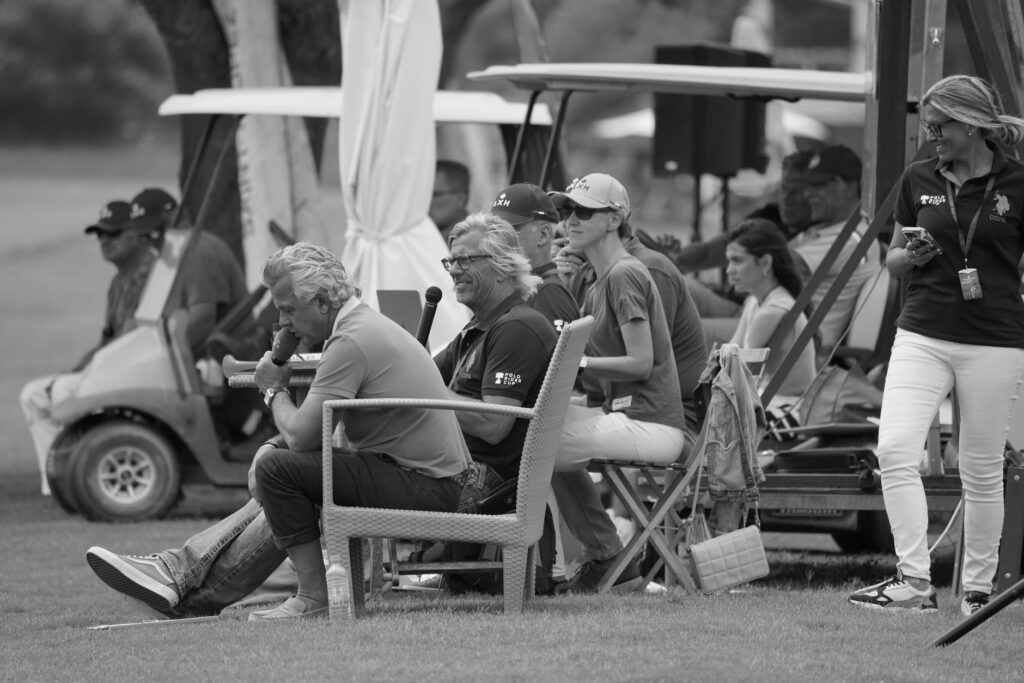Spectators enjoying a sunny day at a Dungeness golf event. — Dungeness golf tournaments