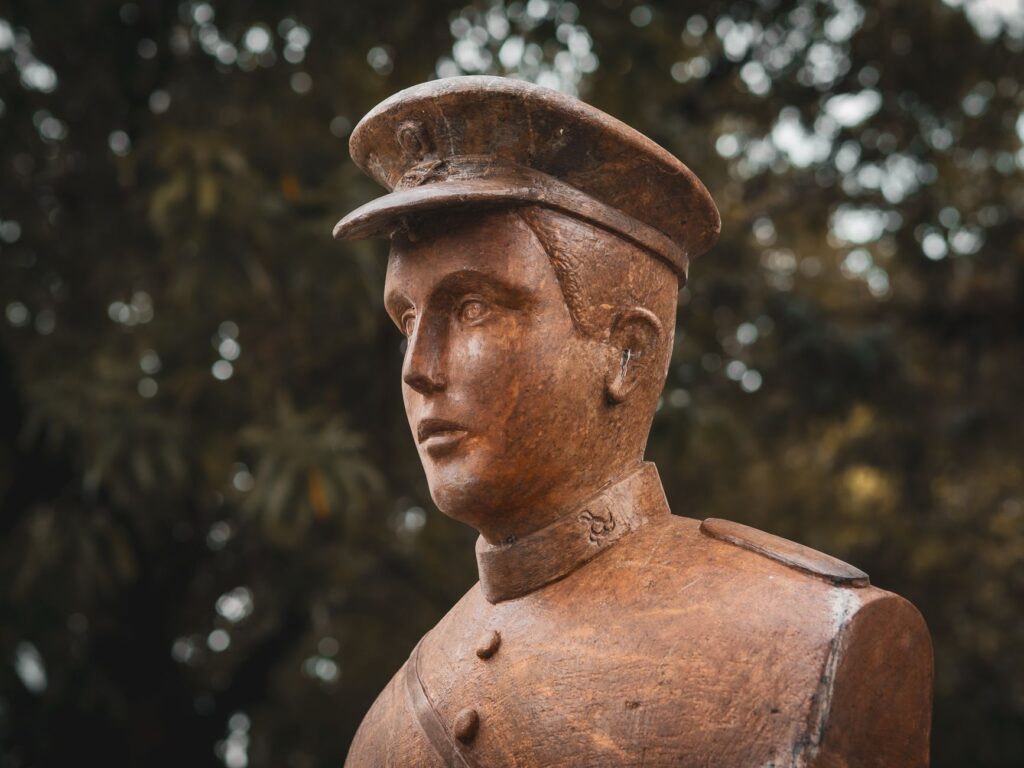 A portrait of a prominent figure in Dungeness golf history, with a brief bio. — history of Dungeness golf