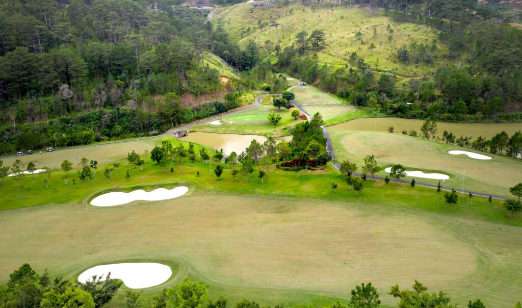 Aerial view of a Dungeness golf resort showcasing lush fairways and scenic backdrops. — Dungeness golf resorts