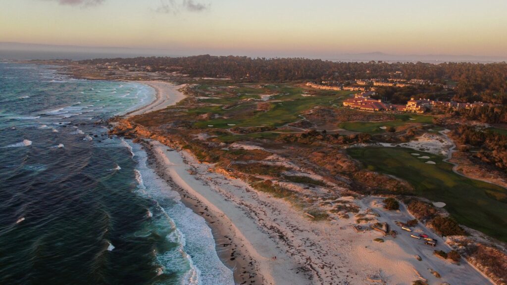 An aerial shot of the coastline with a golf course in the foreground — Dungeness golf local guide